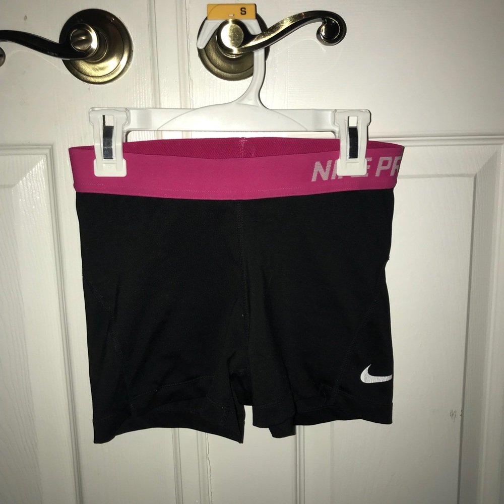 Pink Nike Pro shorts